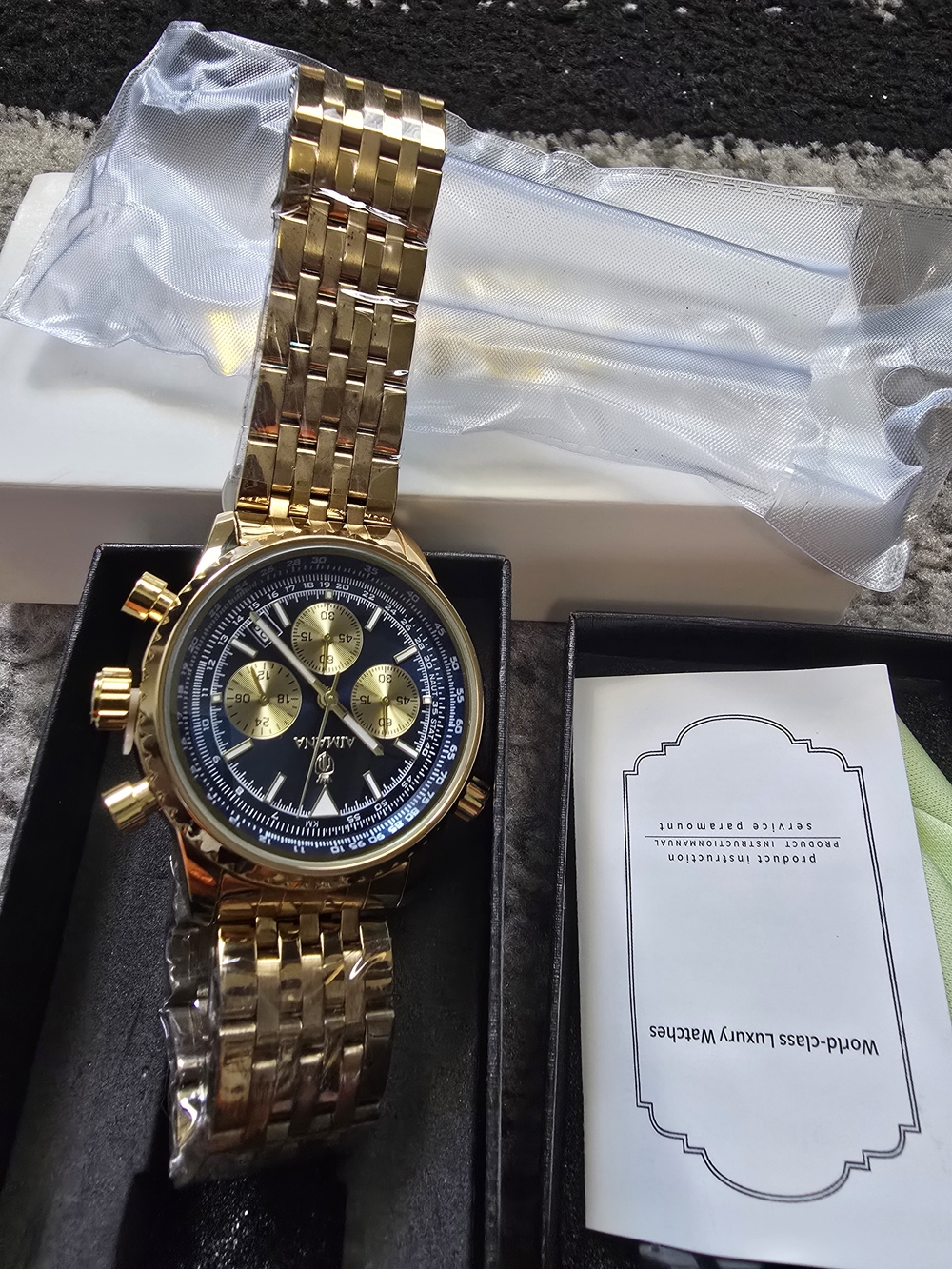 Gold Men's Chronograph Watch with Black Dial